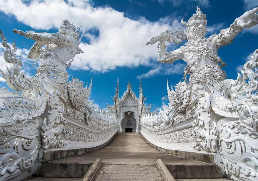 Entrance of Ubosot, white temple Chiang Rai Wat Rong Khun