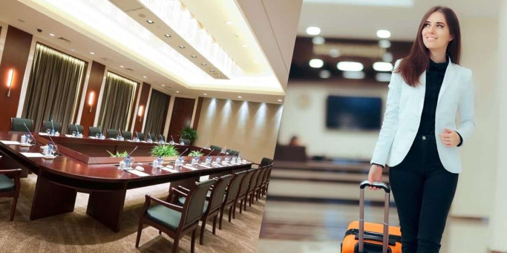 large-conference-room-with-big-table-elegant-woman-business-trip-luggage